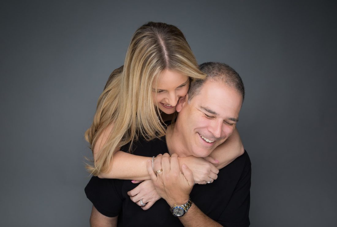 Photo of a wife and husband hugging in Fort Lauderdale